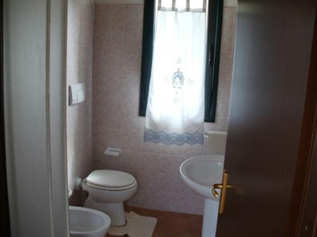 Farm Stay Gli Oleandri Loiri Porto San Paolo Room photo